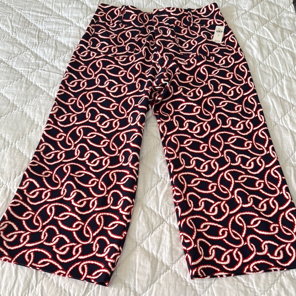 Anthropologie Black and Red Patterned Pants